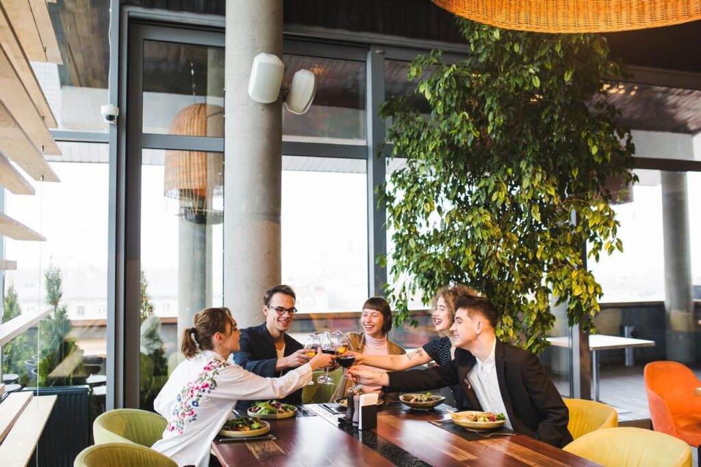 group-friends-eating-restaurant